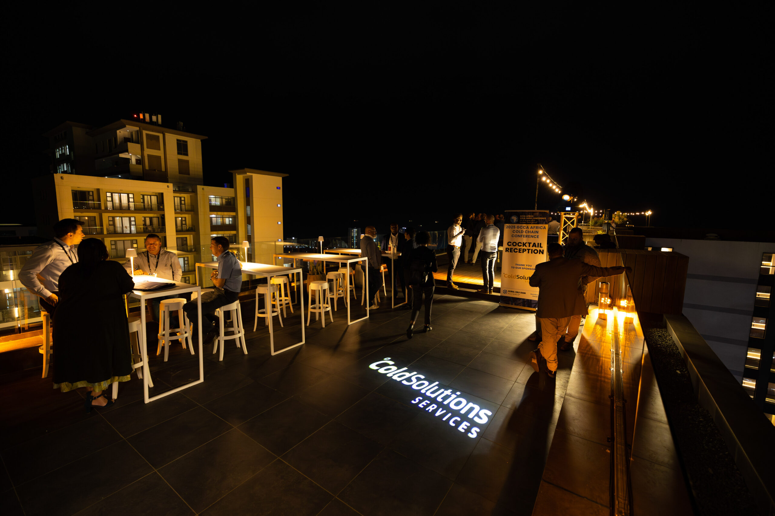 Outdoor Cocktail Party with Lighting Furniture and Branding